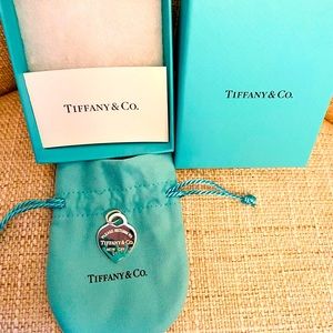 100% Authentic Brand New Tiffany charm with the original box and bag